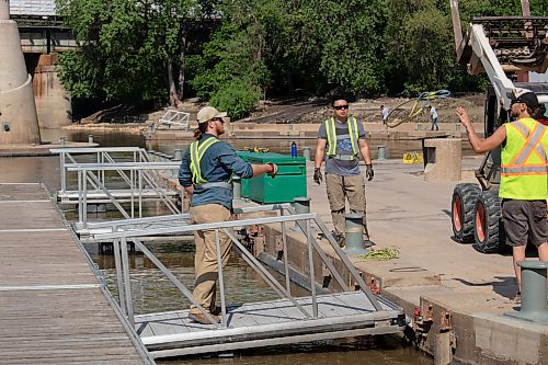 Mike Thiessen / Winnipeg Free Press Seaco Marine crew installing the summer docks at The Forks Historic Port. 230606 &#x2013; Tuesday, June 6, 2023