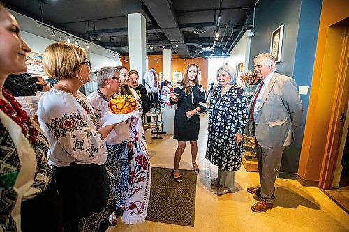 MIKAELA MACKENZIE / WINNIPEG FREE PRESS

Julia Zmerzla introduces governor general Mary Simon and her husband, Whit Fraser, to Ukrainians who work at the Oseredok Ukrainian Cultural and Education Centre on Tuesday, June 6, 2023. For Malak story.
Winnipeg Free Press 2023