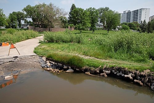 JESSICA LEE / WINNIPEG FREE PRESS

A large hole in the ground at Amarynth Crescent Park is photographed June 7, 2023. Pieces of stone can be seen under the grass.

Reporter: Joyanne Pursaga