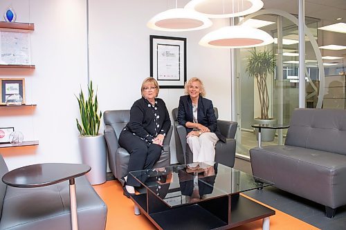 Mike Thiessen / Winnipeg Free Press   
Barb Gamey (left), co-founder of Payworks, and Lee Meagher, founder of Scootaround Inc. in Gamey&#x2019;s Payworks office. Meagher and Gamey will be inducted into the Manitoba Business Hall of Fame on June 21, 2023.   230607 &#x2013; Wednesday, June 7, 2023