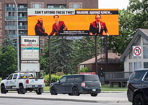 JESSICA LEE / WINNIPEG FREE PRESS

A political attack sign near Polo Park featuring Justin Trudeau, Jagmeet Singh and Wab Kinew is photographed June 6, 2023.

Reporter: Tom