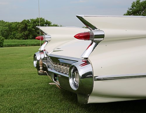 The iconic high tailfins and double tail lights on Elwin and Elaine Kettner's 1959 Cadillac 2-door convertible, as it sits in a park near their home northwest of Brandon on Thursday. (Michele McDougall/The Brandon Sun) 