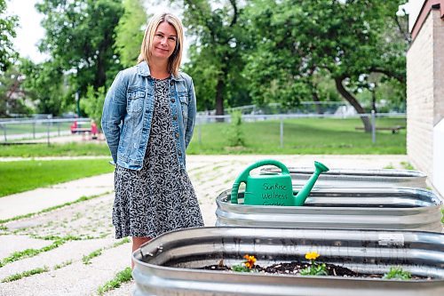 MIKAELA MACKENZIE / WINNIPEG FREE PRESS


Marcie Wood, director of Willow Place (a family violence shelter), poses for a photo with the new garden boxes on Thursday, June 8, 2023. The shelter is one of 12 community organizations that recieved funding through Winnipeg Food Council&#x2019;s Community Gardens and Urban Agriculture small grants program. For &#x2014; story.
Winnipeg Free Press 2023