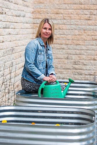 MIKAELA MACKENZIE / WINNIPEG FREE PRESS


Marcie Wood, director of Willow Place (a family violence shelter), poses for a photo with the new garden boxes on Thursday, June 8, 2023. The shelter is one of 12 community organizations that recieved funding through Winnipeg Food Council&#x2019;s Community Gardens and Urban Agriculture small grants program. For &#x2014; story.
Winnipeg Free Press 2023