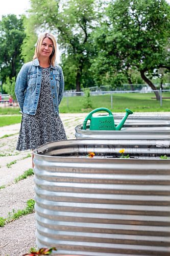 MIKAELA MACKENZIE / WINNIPEG FREE PRESS


Marcie Wood, director of Willow Place (a family violence shelter), poses for a photo with the new garden boxes on Thursday, June 8, 2023. The shelter is one of 12 community organizations that recieved funding through Winnipeg Food Council&#x2019;s Community Gardens and Urban Agriculture small grants program. For &#x2014; story.
Winnipeg Free Press 2023