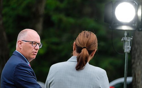 Mike Deal / Winnipeg Free Press
Mayor Scott Gillingham turns to look at Premier Heather Stefanson while speaking during an announcement that the provincial government is committing to invest in critical infrastructure projects to promote new commercial and residential development, and position the province as a strategic transportation hub, during an event in Kildonan Park Thursday morning. 
230608 - Thursday, June 08, 2023.