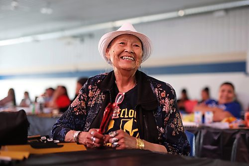 08062023
Yvonne De Paola of Sioux Valley Dakota Nation smiles as she watches game three of the Stanley Cup finals between the Las Vegas Golden Knights and the Florida Panthers, during a Stanley Cup viewing party for community members at Sioux Valley on Thursday evening. Zach Whitecloud #2 of the Las Vegas Golden Knights is from Sioux Valley. The event featured a BBQ supper, cake and the game broadcast on two big screens. (Tim Smith/The Brandon Sun)
