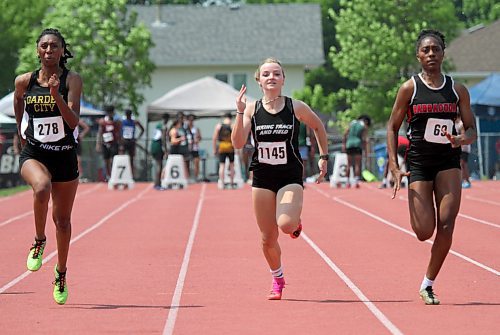 Amira Lawrence, left, of Garden City won the varsity girls' 100-metre dash final over Vincent Massey's Kendra Schram (bronze) and College Beliveau's Jazmin Birch (silver) at high school track and field provincials at Brandon's UCT Stadium on Friday. (Thomas Friesen/The Brandon Sun)