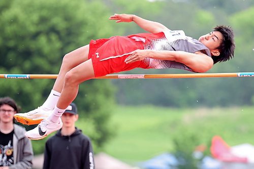 Hayden Caraoa of Winnipeg's Kelvin High School sails over the bar during the varsity boys high jump event at the MHSAA Provincial Track and Field Championships at UCT Stadium on Friday. Caraoa placed first in the event. More photos on Page A6, and more coverage starting on Page B1. (Tim Smith/The Brandon Sun)