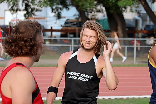 Vincent Massey's Thomas Boychuk flashes a smile shortly after his gold-medal winning throw of 49.59 metres in the varsity boys javelin final. (Lucas Punkari/The Brandon Sun)