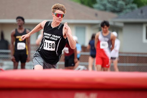 09062023
Jay Beswitherick of Vincent Massey High School sprints up to the bar during the Varsity Boys High Jump event at the MHSAA Provincial Track &amp; Field Championships at UCT Stadium on Friday.   (Tim Smith/The Brandon Sun)
