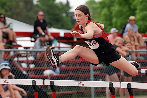 09062023
Ky-Lynn Jenner of Morden Collegiate leaps over a gate during the Junior Varsity Girls 80 Meter Hurdles at the MHSAA Provincial Track &amp; Field Championships at UCT Stadium on Friday. 
(Tim Smith/The Brandon Sun)