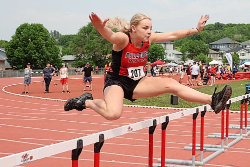 09062023
Hailey Bird of Elkhorn School leaps over a gate during the Varsity Girls 100 Meter Hurdles at the MHSAA Provincial Track &amp; Field Championships at UCT Stadium on Friday. 
(Tim Smith/The Brandon Sun)