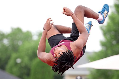 09062023
Giovanni Ajiamah of St. Paul&#x2019;s High School falls upside-down to the mat during the Varsity Boys High Jump event at the MHSAA Provincial Track &amp; Field Championships at UCT Stadium on Friday.   (Tim Smith/The Brandon Sun)