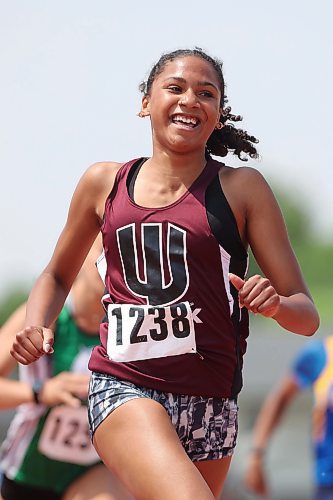 09062023
Kyla Findley of Westwood Collegiate smiles as she wins the Junior Varsity Girls 100 Meter Dash at the MHSAA Provincial Track &amp; Field Championships at UCT Stadium on Friday. 
(Tim Smith/The Brandon Sun)