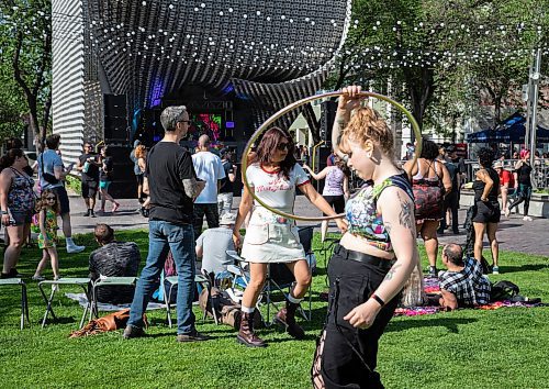 JESSICA LEE / WINNIPEG FREE PRESS

Kait Nernberg (with hoop) dances at Memetic, an Electric Music Festival held at the Cube in the Exchange District, on June 10, 2023. About a hundred people attended.

Stand up