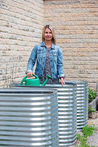 MIKAELA MACKENZIE / WINNIPEG FREE PRESS


Marcie Wood, director of Willow Place (a family violence shelter), poses for a photo with the new garden boxes on Thursday, June 8, 2023. The shelter is one of 12 community organizations that recieved funding through Winnipeg Food Council&#x2019;s Community Gardens and Urban Agriculture small grants program. For &#x2014; story.
Winnipeg Free Press 2023