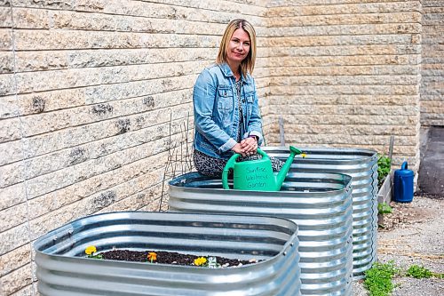 MIKAELA MACKENZIE / WINNIPEG FREE PRESS


Marcie Wood, director of Willow Place (a family violence shelter), poses for a photo with the new garden boxes on Thursday, June 8, 2023. The shelter is one of 12 community organizations that recieved funding through Winnipeg Food Council&#x2019;s Community Gardens and Urban Agriculture small grants program. For &#x2014; story.
Winnipeg Free Press 2023