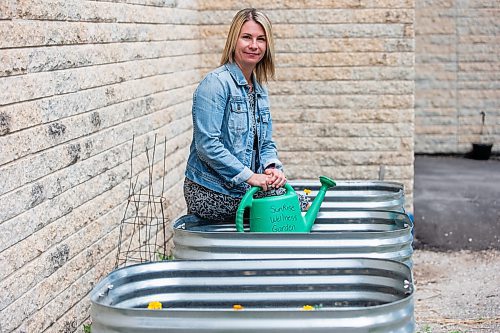 MIKAELA MACKENZIE / WINNIPEG FREE PRESS


Marcie Wood, director of Willow Place (a family violence shelter), poses for a photo with the new garden boxes on Thursday, June 8, 2023. The shelter is one of 12 community organizations that recieved funding through Winnipeg Food Council&#x2019;s Community Gardens and Urban Agriculture small grants program. For &#x2014; story.
Winnipeg Free Press 2023