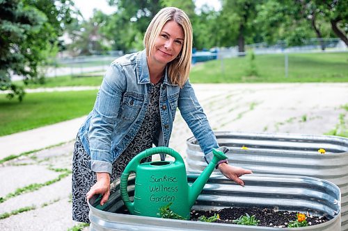 MIKAELA MACKENZIE / WINNIPEG FREE PRESS


Marcie Wood, director of Willow Place (a family violence shelter), poses for a photo with the new garden boxes on Thursday, June 8, 2023. The shelter is one of 12 community organizations that recieved funding through Winnipeg Food Council&#x2019;s Community Gardens and Urban Agriculture small grants program. For &#x2014; story.
Winnipeg Free Press 2023