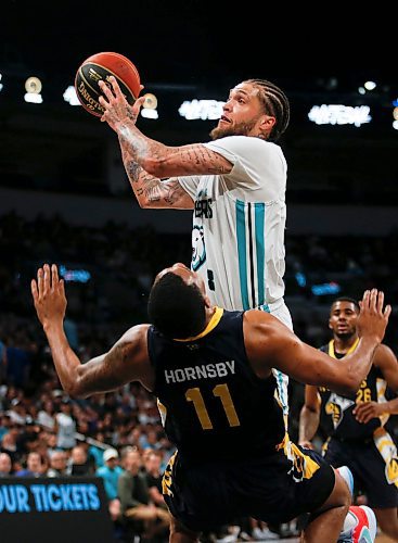 JOHN WOODS / WINNIPEG FREE PRESS
Winnipeg Sea Bears&#x2019; Teddy Allen (8) goes for the basket against Edmonton Stingers&#x2019; Nick Hornsby (11) in first half CEBL action in Winnipeg, Monday, June 12, 2023. 

Reporter: sawatzki