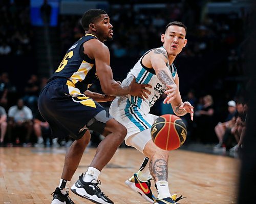 JOHN WOODS / WINNIPEG FREE PRESS
Winnipeg Sea Bears&#x2019; Glen Yang (11) makes the pass against Edmonton Stingers&#x2019; Geoffrey James (26) in first half CEBL action in Winnipeg, Monday, June 12, 2023. 

Reporter: sawatzki