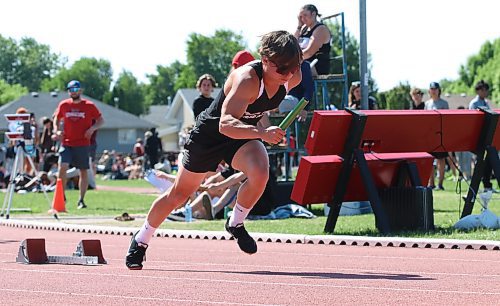 Lucas Cels gives Vincent Massey Vikings a strong start in the boys varsity 4x100 relay race at Brandon&#x2019;s UCT Stadium during the Manitoba High School Athletic Association&#x2019;s track and field provincials on Saturday afternoon. (Perry Bergson/The Brandon Sun)
