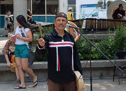 Mike Thiessen / Winnipeg Free Press 
Elder David Budd leads a Letting Go ceremony at Air Canada Park&#x2019;s annual planting and celebration event. The plan for Air Canada Park&#x2019;s redesign was announced at today&#x2019;s event. For Malak Abas. 230612 &#x2013; Friday, June 12, 2023