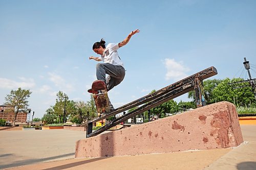 12062023
Nick Powell does a nollie over-crooked-grind while skateboarding at the Kristopher Campbell Memorial Skatepark on Monday during a demo/ best trick contest with members of Winnipeg's Sk8 Skates team and Brandon's Recovery Skateshop team. 
(Tim Smith/The Brandon Sun)
