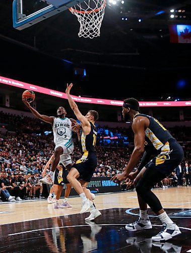 JOHN WOODS / WINNIPEG FREE PRESS
Winnipeg Sea Bears&#x2019; Jelani Watson-Gayle (3) goes up for the basket against Edmonton Stingers in first half CEBL action in Winnipeg, Monday, June 12, 2023. 

Reporter: sawatzki