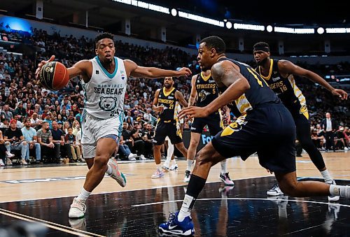 JOHN WOODS / WINNIPEG FREE PRESS
Winnipeg Sea Bears&#x2019; E.J. Anosike (24) keeps the ball in against Edmonton Stingers in first half CEBL action in Winnipeg, Monday, June 12, 2023. 

Reporter: sawatzki