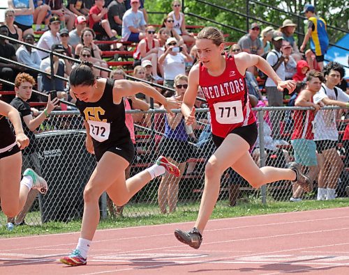 Angela Gundrum, right, won a junior varsity girls' gold medal in high jump and bronze in pentathlon at track and field provincials in Brandon on last weekend. (Thomas Friesen/The Brandon Sun)