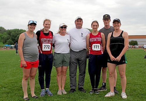 The Gundrum family has been the driving force behind Prairie Mountain High School's sustained track and field success for more than a decade. Pictured at provincials on Friday are Jessica Huggart, from left, Maria, Christine, Marvin, Angela, Adam and Natalie. (Thomas Friesen/The Brandon Sun)