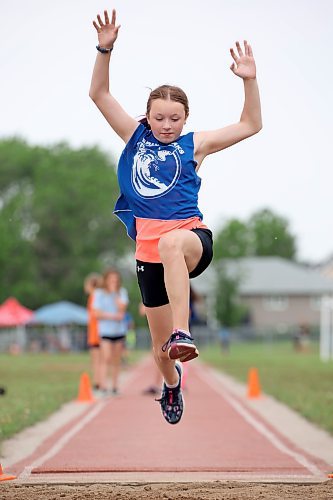 Kensley Wilson, a Grade 5 student from Waverly Park School, competes in the long jump event at the Brandon School Division City Wide Track Meet at the UCT Stadium on Tuesday. More photos on Page A5. (Tim Smith/The Brandon Sun)