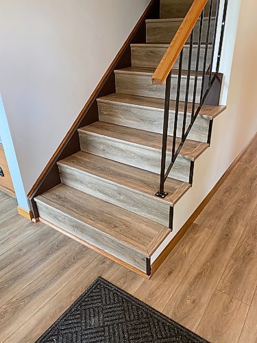 Photos by Marc LaBossiere / Winnipeg Free Press
The vinyl plank was used to sheathe the rise and run of each stair, with a matching nosing mounted along every top-front edge.