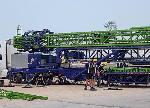 Mike Thiessen / Winnipeg Free Press 
Contractors set up a ride at the Red River Ex. The Ex will be spending twice as much as usual on security this year, following a shooting incident last summer. For Tyler Searle. 230613 &#x2013; Tuesday, June 13, 2023