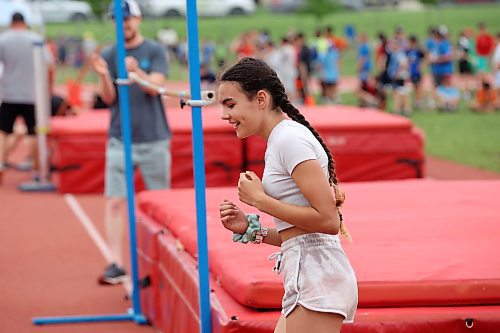13062023
Alanna Fontaine, a grade six student from J.R. Reid School, celebrates after clearing the bar during the high jump event at the Brandon School Division City Wide Track Meet at the UCT Stadium on Tuesday. 
(Tim Smith/The Brandon Sun)