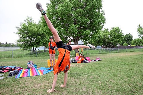 13062023
Lux Opperman of Maryland Park School does a cartwheel during the Brandon School Division City Wide Track Meet at the UCT Stadium on Tuesday. 
(Tim Smith/The Brandon Sun)