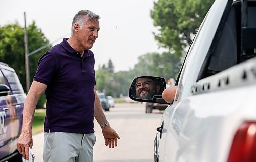 JOHN WOODS / WINNIPEG FREE PRESS
Maxime Bernier, leader of the People&#x2019;s Party of Canada (PPC), speaks to Henry Dyck as he canvasses residents in Roland, Manitoba, Tuesday, June 13, 2023. Bernier is running in the Portage-Lisgar by-election.

Reporter: sanders
