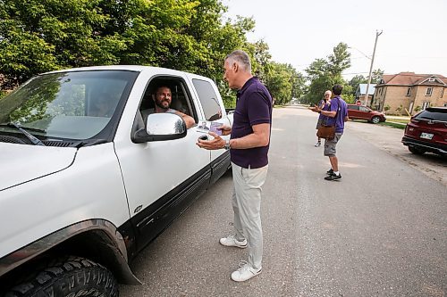 JOHN WOODS / WINNIPEG FREE PRESS
Maxime Bernier, leader of the People&#x2019;s Party of Canada (PPC), speaks to Henry and Samantha Dyck as he canvasses residents in Roland, Manitoba, Tuesday, June 13, 2023. Bernier is running in the Portage-Lisgar by-election.

Reporter: sanders
