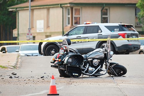 MIKE DEAL / WINNIPEG FREE PRESS
Winnipeg Police investigate a MVC between a white van and a motorcycle at Talbot Avenue and Levis Street. Talbot is closed between Brazier and Stadacona streets while they investigate. 
230614 - Wednesday, June 14, 2023