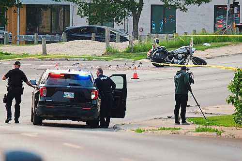 MIKE DEAL / WINNIPEG FREE PRESS
Winnipeg Police investigate a MVC between a white van and a motorcycle at Talbot Avenue and Levis Street. Talbot is closed between Brazier and Stadacona streets while they investigate. 
230614 - Wednesday, June 14, 2023