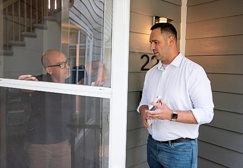 JESSICA LEE / WINNIPEG FREE PRESS

Liberal candidate Ben Carr (right) speaks to North River Heights resident Harry Ingleby at his home June 14, 2023 while canvassing.

Reporter: Danielle Da Silva