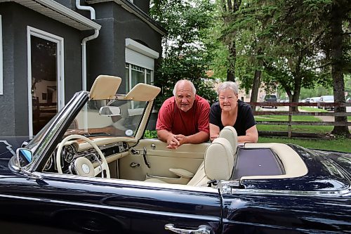 Manfred and Penny Wicht about to enjoy a ride in their 1965 Mercedes Benz 230 SL ‘Pagoda’, two-seat roadster/coupé, also known as the Mercedes Benz W113 convertible in Brandon on Thursday. (Michele McDougall/The Brandon Sun)
