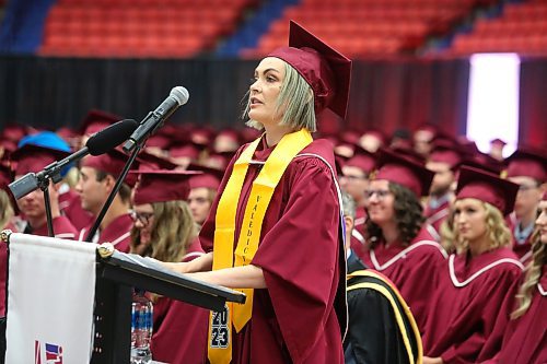 Assiniboine Community College valedictorian (business administration) Brittany Blair addresses the crowd during Friday morning's graduation ceremony at the Westoba Place arena. The afternoon ceremony featured a speech from fellow valedictorian Diorella Marie Inocentes, who obtained a degree in practical nursing. (Kyle Darbyson/The Brandon Sun) 
