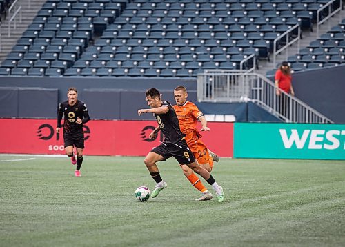 JESSICA LEE / WINNIPEG FREE PRESS

Valour FC player Walter Ponce (9) battles for the ball with Forge FC player Rezart Rama (24) during a game at IG Field June 16, 2023.

Reporter: Joshua Frey-Sam