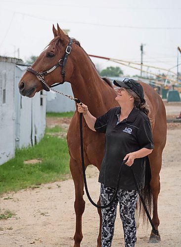 Mike Thiessen / Winnipeg Free Press 
Trainer Victoria Morse with her horse, Captive Kitten, at the Assiniboia Downs stables. Captive Kitten, Morse&#x2019;s only horse, recovered from an injury to go on to win as longshot. 230616 &#x2013; Friday, June 16, 2023