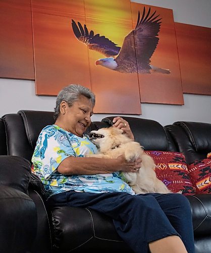 Mike Thiessen / Winnipeg Free Press 
Ruby Vanasse with her dog Blondie. Blondie is believed to have been cut loose from her leash in the yard outside Vanasse&#x2019;s apartment, and was miraculously reunited with her owners over a year later. For Graham McDonald. 230616 &#x2013; Friday, June 16, 2023