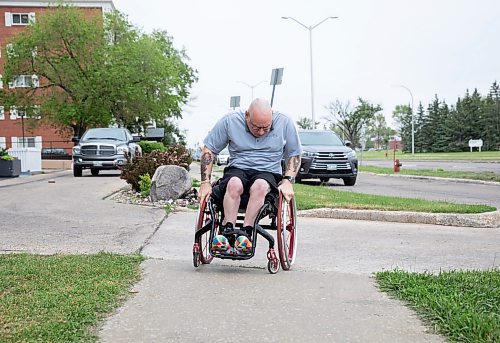 JESSICA LEE / WINNIPEG FREE PRESS

Peter Tonge, disability advocate, is photographed near his Grant Park home on June 16, 2023.

Reporter: Malak Abas