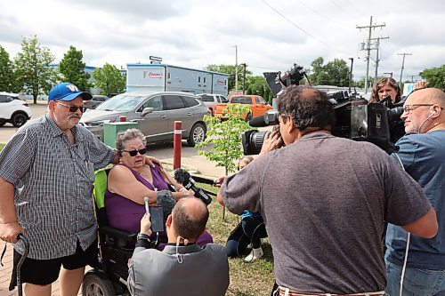 16062023
Dauphin residents Glenn and Sandra Kaleta speak to journalists on Friday in the wake of the tragedy that claimed the lives of 15 Dauphin residents and injured 10 others on the Trans Canada Highway at Carberry on Thursday. The Kaleta&#x2019;s are members of the Dauphin Active Living Centre and friends with some of the victims of the collision. 
(Tim Smith/The Brandon Sun)